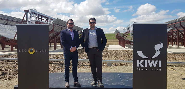 Picture of Julian Ramsay and Chris Watson of Ruamoko Solutions in front of the Kiwi Space Radar.
