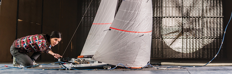 Decorative image: model sailboat in a wind tunnel.