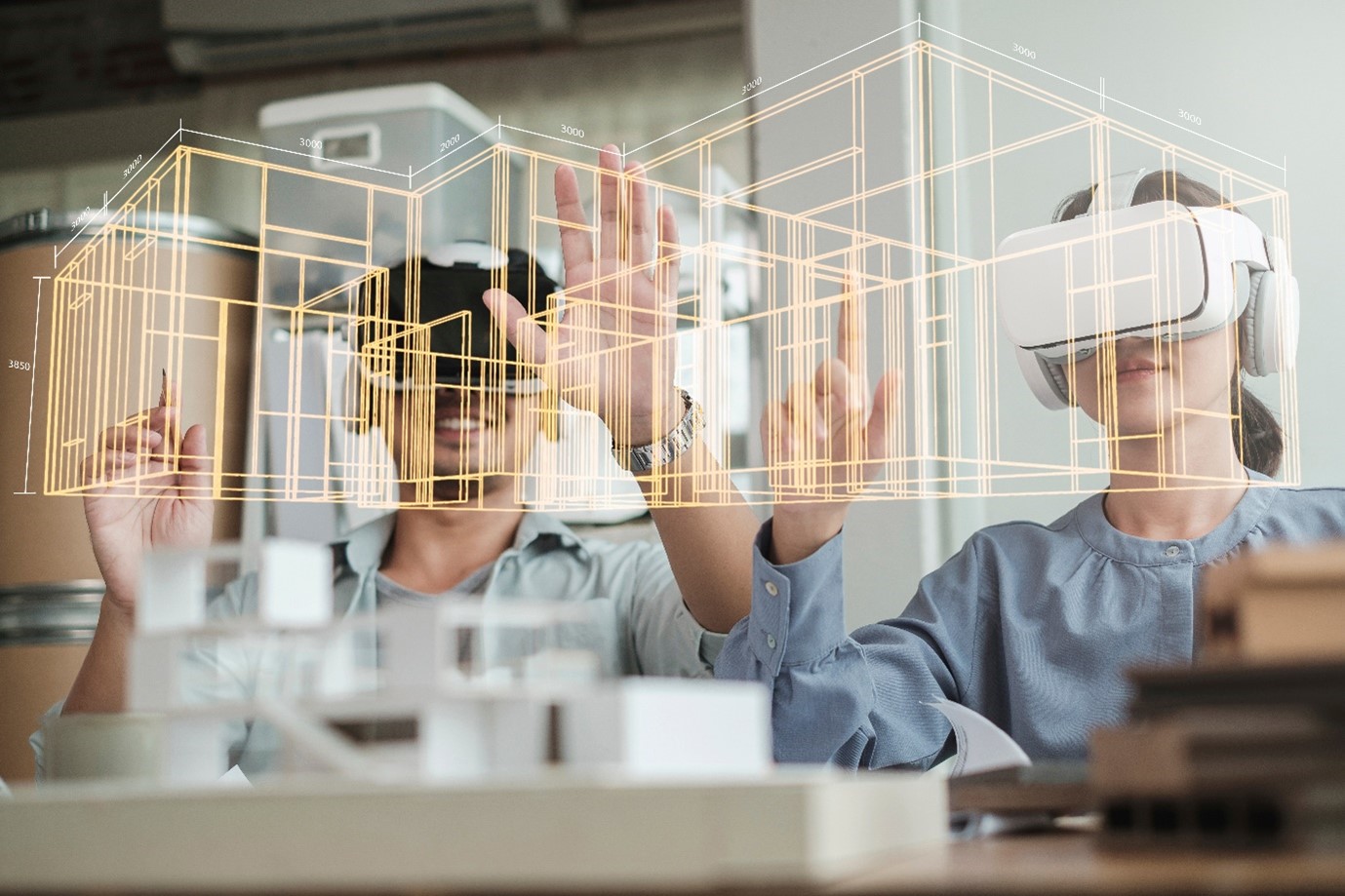 Two people using virtual reality headset to visualise a building design.