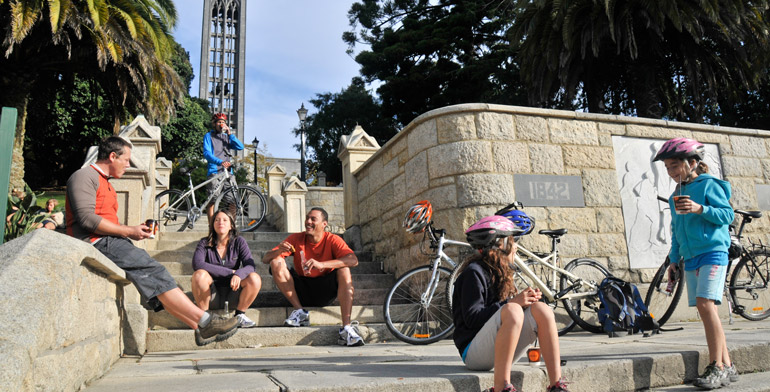 Cyclists on Church steps in Nelson City
