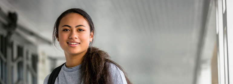 A photo of a young person looking straight ahead