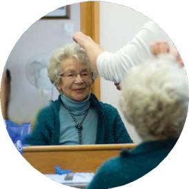 Retirement village resident getting hair done. 