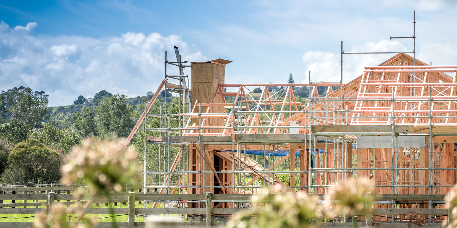 House being built with scaffolding