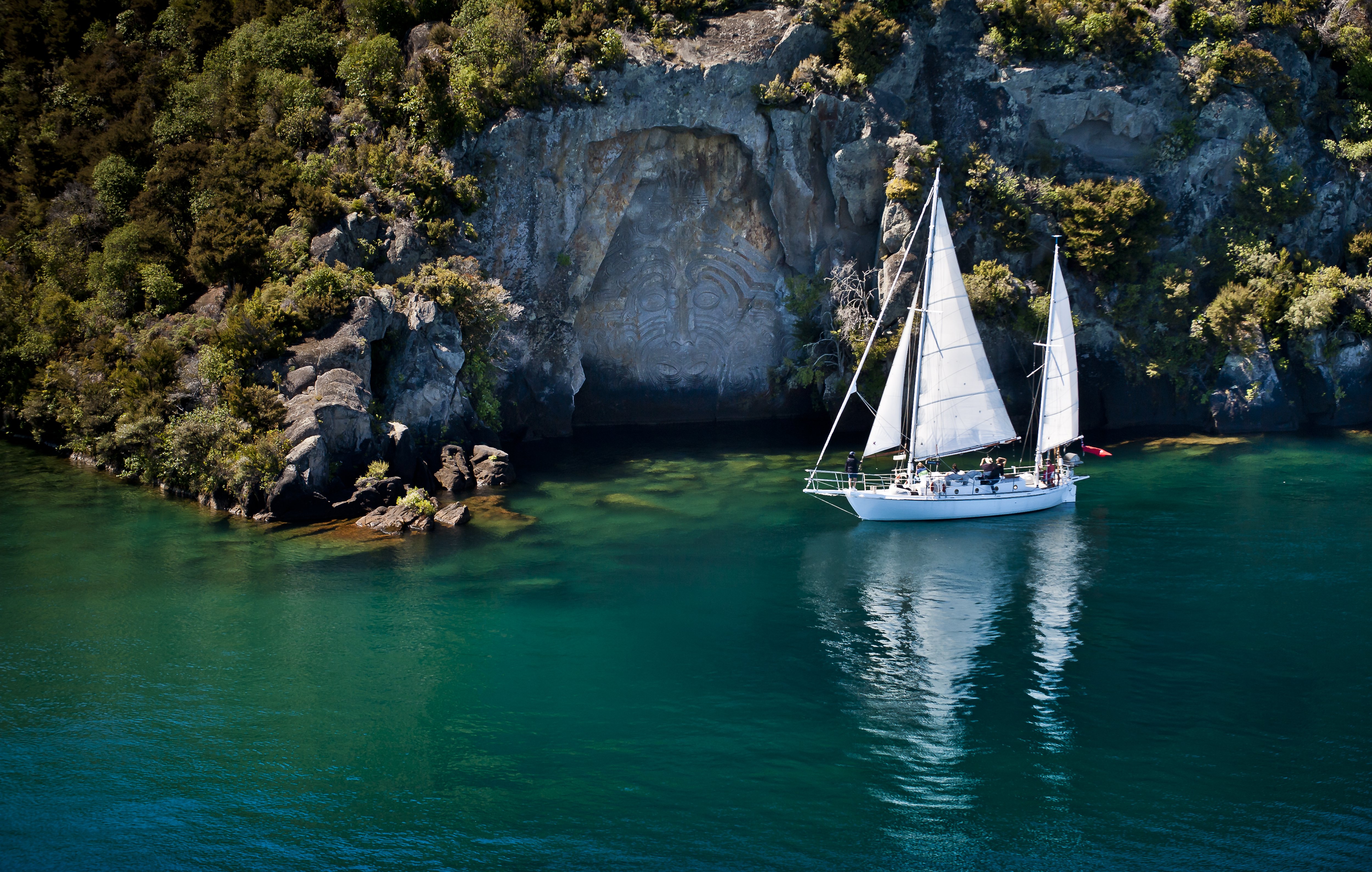 Viewing the Mine Bay Māori Rock Carvings by sailboat