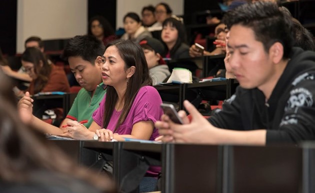 People in a lecture theatre.