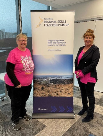 Canterbury Regional Skills Leadership Group Co-chairs Liz Brown and Karena Brown beside an RSLG banner