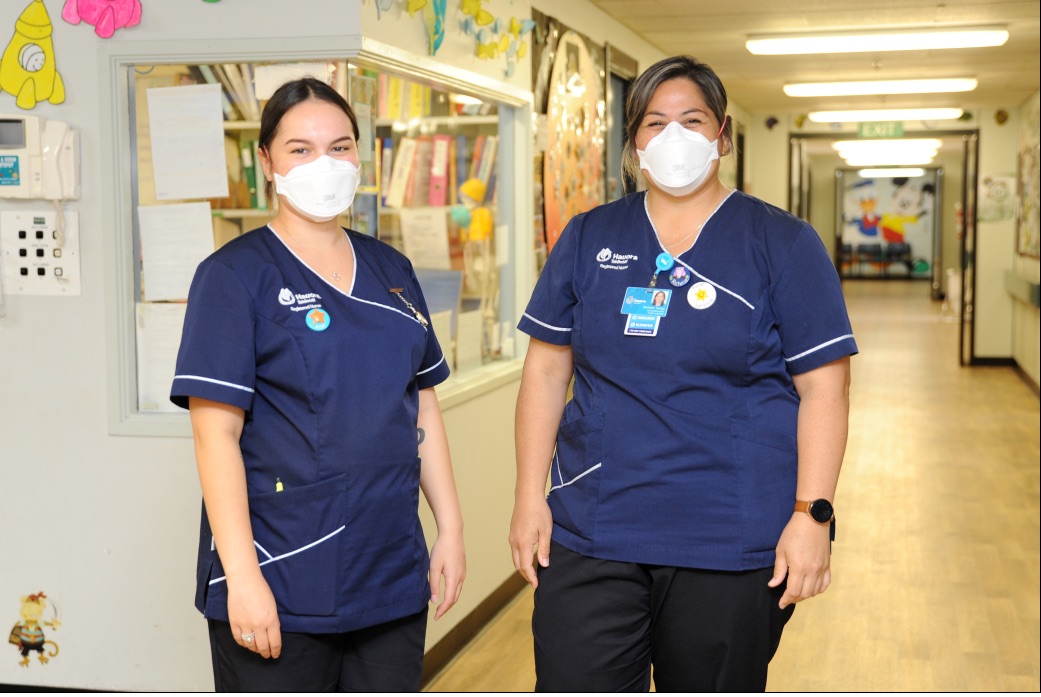 2 female nurses wearing masks, in Gisborne Hospital