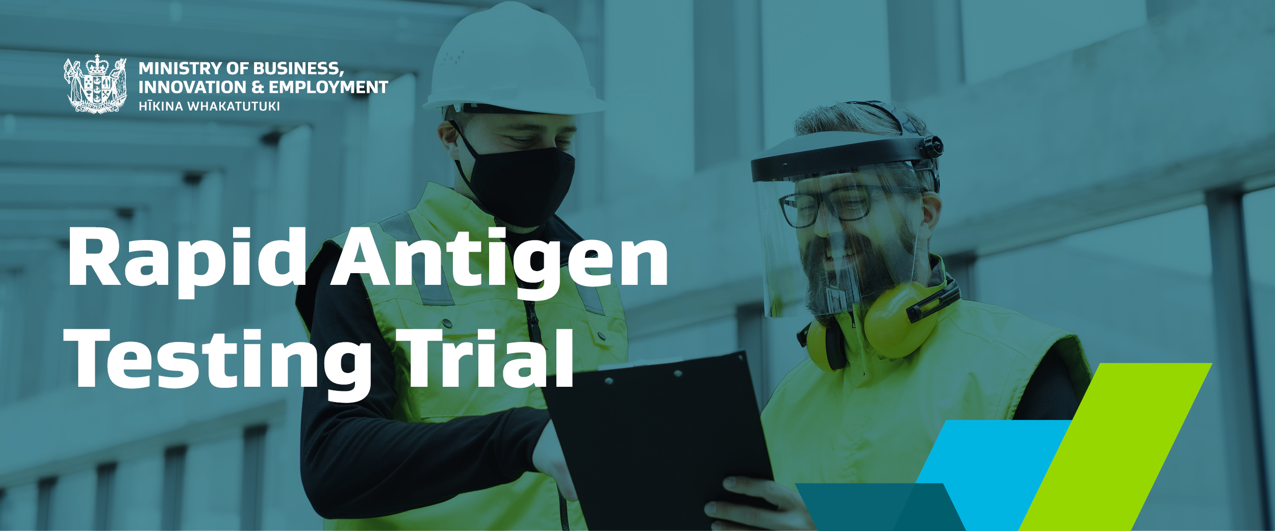 Image of two workers in high vis wearing PPE with the text "Rapid Antigen Testing Trial".