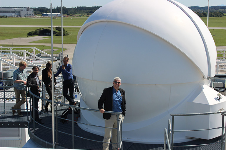 DLR's Institute for Communication and Navigation in Oberpfaffenhofen. Left to right: Jan Krecke (PhD candidate, UoA), Andrew Austin (UoA), Olga Trivailo (DLR) Christian Fuchs (DLR-IKN) and Nicholas Rattenbury (UoA) in the foreground. Photo by John Cater (UoA).