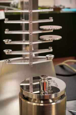 Array of metallic objects used as standards for calibrating units of weight and mass