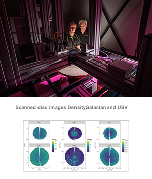 2.	Researchers observing the DiscBot wood quality scanner, with inset of scanned wood