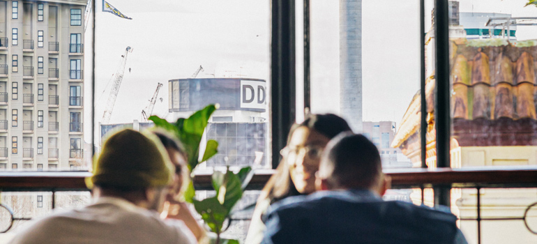 people in a cafe auckland 770x350