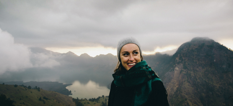 person wearing beanie and scarf outside 770x350