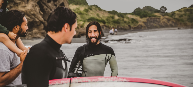 surfers with wetsuits 770x350