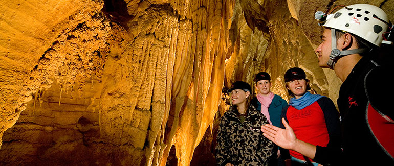 Tourists being guided around Waitomo Caves. 